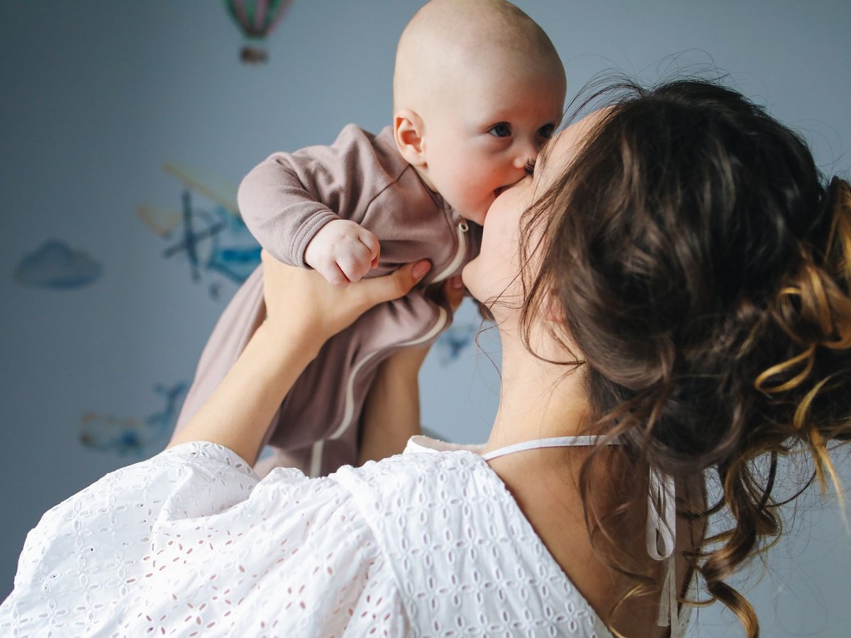 Mother holding her baby