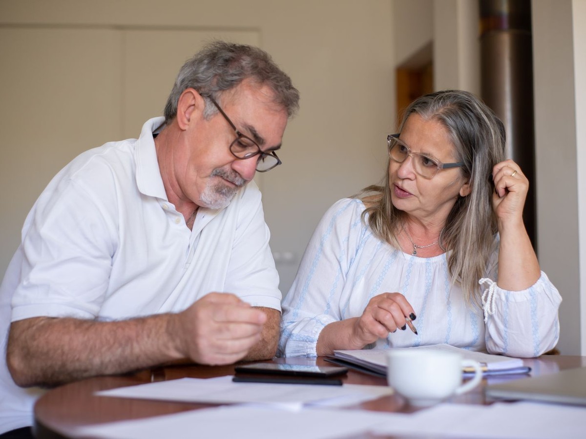 Older couple reviewing documents