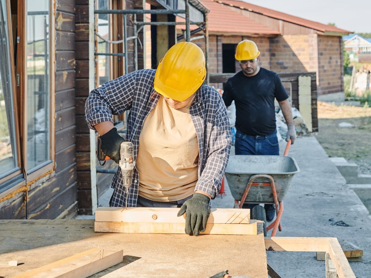 Construction workers wearing safety helmets